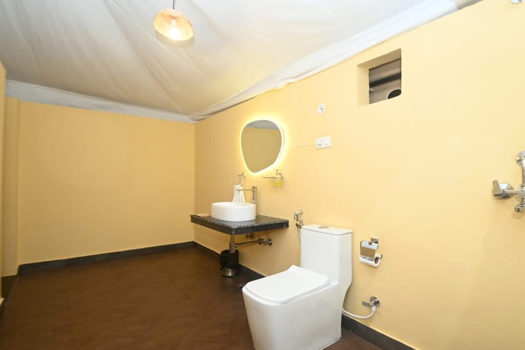 Well designed toilet area in swiss cottage bathroom at Baghin resort